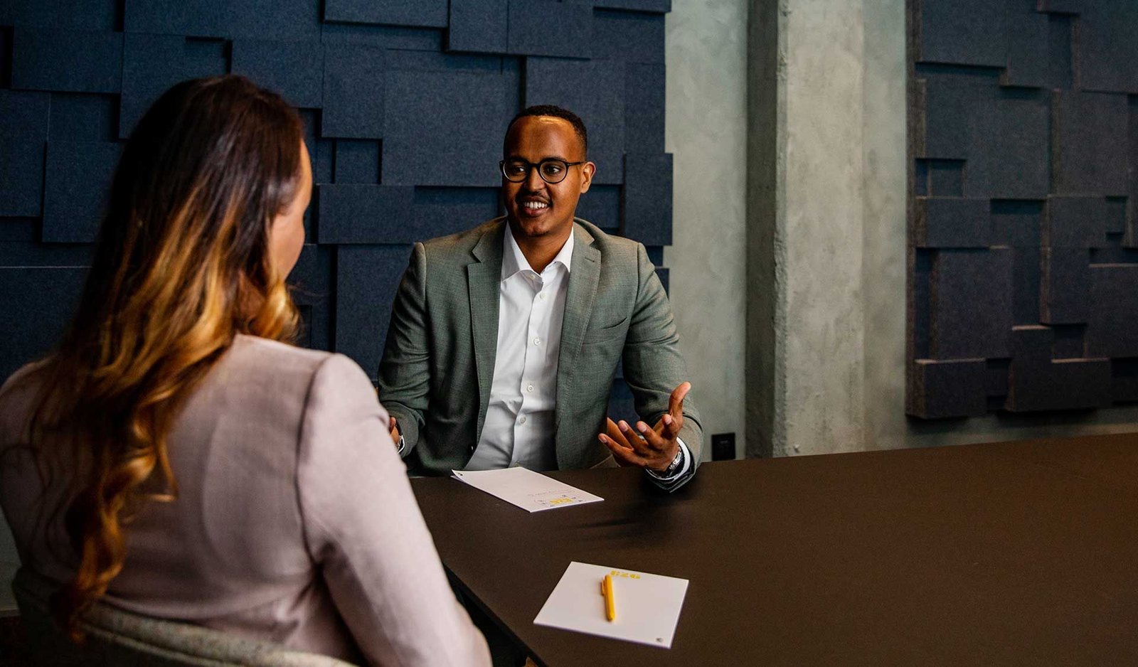 Hassan Yusuf in a professional meeting, from the original Optimise Results website